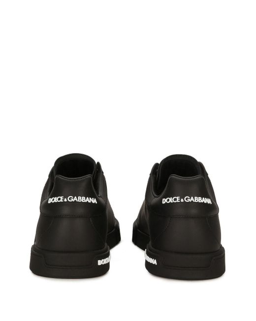 | Sneakers nere in pelle di vitello con logo bianco | male | NERO | 40 di Dolce & Gabbana in Black da Uomo