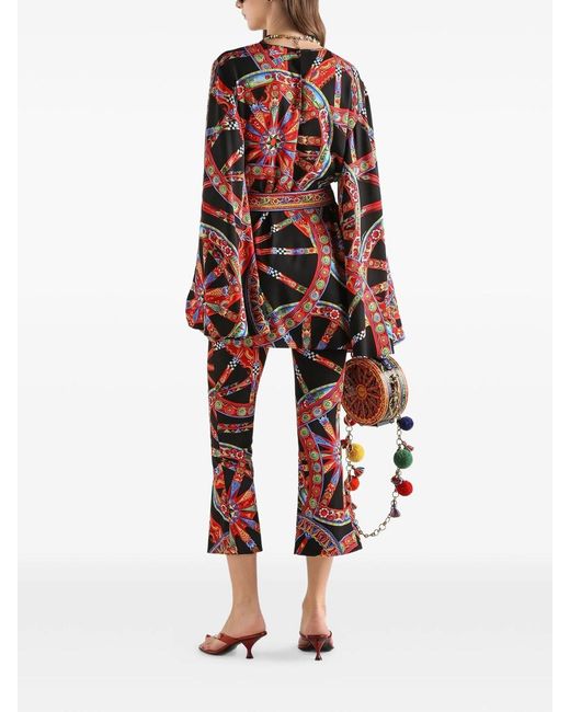 Dolce & Gabbana Red Silk Pants With Cart Print