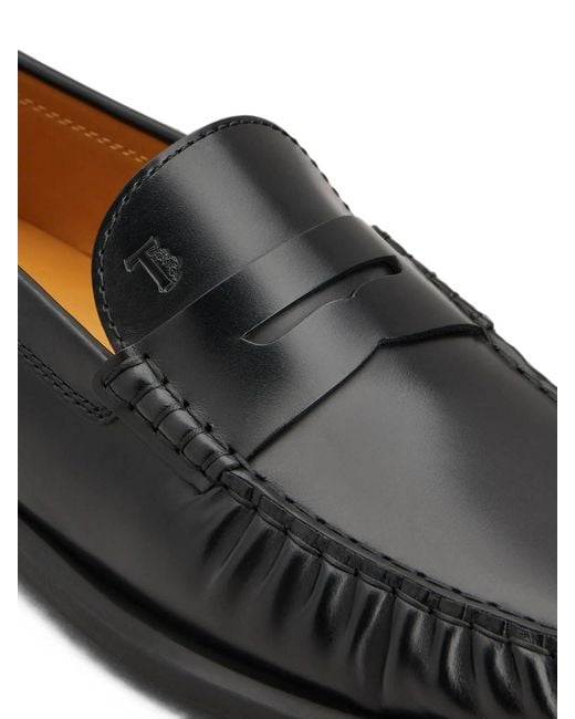Tod's Black Ruffled Penny Loafers With Rubber Sole for men
