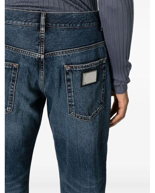 Jeans dritti con placca logo di Dolce & Gabbana in Blue da Uomo