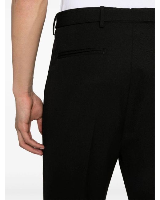 Pantaloni a gamba ampia con pieghe di Prada in Black da Uomo