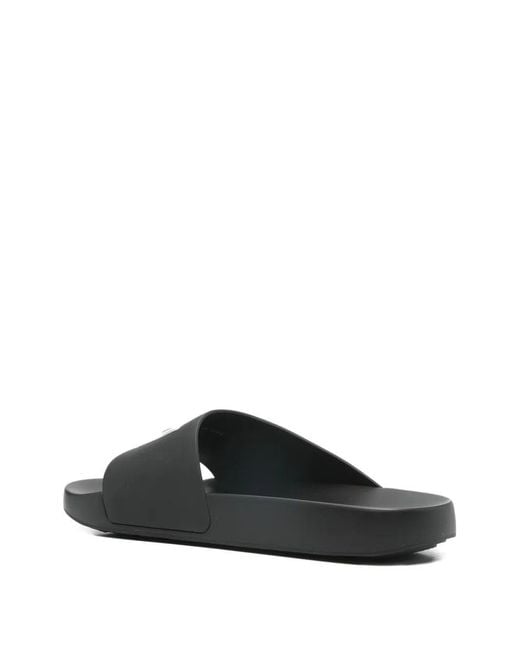 Givenchy White Asymmetric Rubber Sandals for men