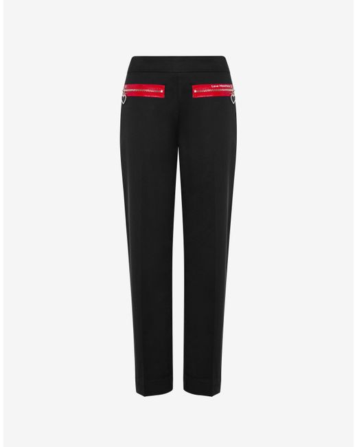 Pantalon En Satin Stretch Zippers & Hearts Moschino en coloris Black