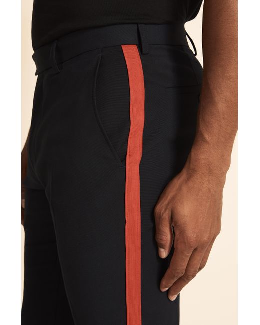 trousers with red side stripe