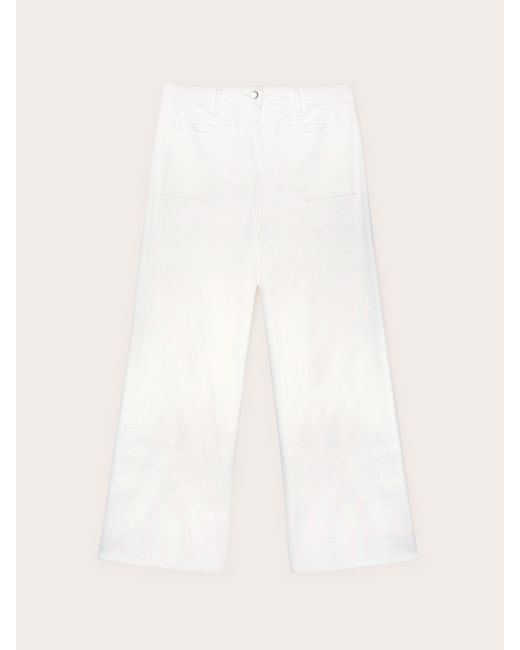 Pantaloni cropped sfrangiati sul fondo di mötivi in White