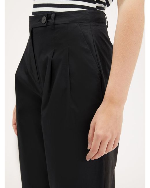 Pantaloni cropped con pinces di mötivi in Black
