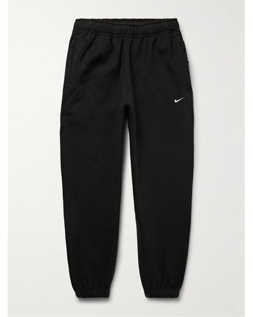 Nike Black Solo Swoosh Tapered Logo-embroidered Cotton-blend Jersey Sweatpants for men