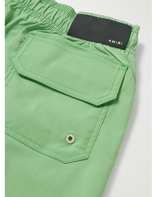 Shorts da mare medi a gamba dritta con logo di Amiri in Green da Uomo