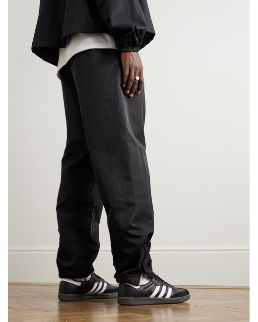 Fear Of God Tapered Logo Appliqued Recycled Shell Track Pants in Black for Men Lyst UK
