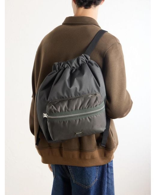 Sacai Black Logo-Appliquéd Shell Drawstring Backpack for men