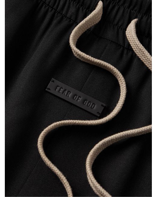Pantaloni a gamba larga in twill di misto seta e lana vergine con logo applicato e coulisse di Fear Of God in Black da Uomo
