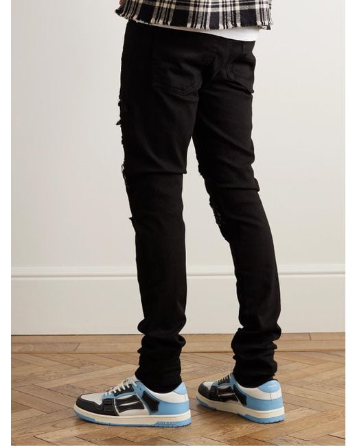 Amiri Black Thrasher Skinny-fit Leather-panelled Distressed Jeans for men