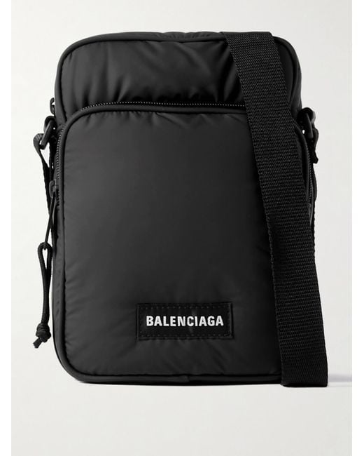 Balenciaga Black Explorer Logo-Appliquéd Padded Nylon Messenger Bag for men