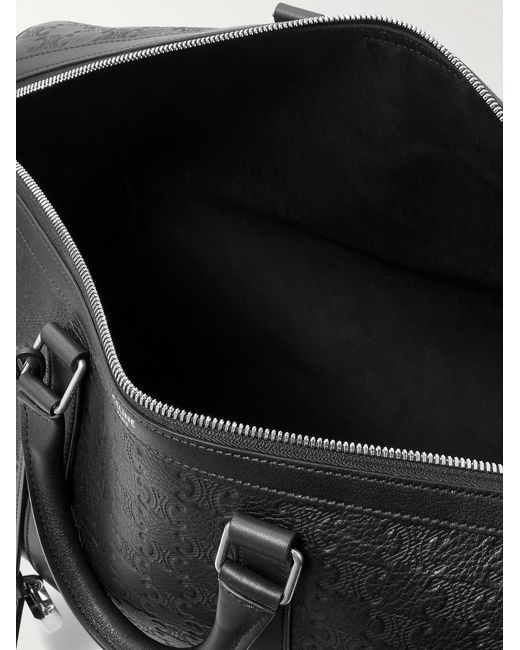 Medium Voyage Logo-Debossed Leather Holdall di Céline in Black da Uomo