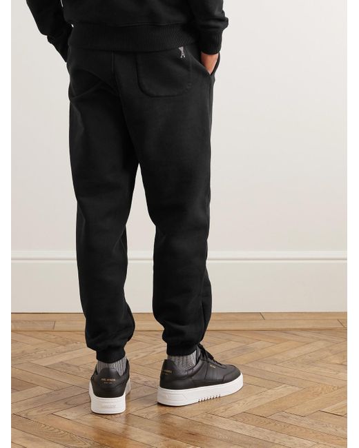 AMI Black Tapered Logo-embroidered Organic Cotton-jersey Sweatpants for men