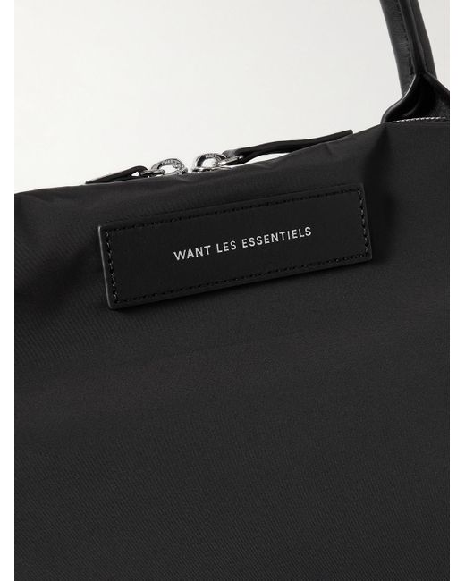Want Les Essentiels De La Vie Black Hartsfield 2.0 Leather-trimmed Nylon Weekend Bag for men