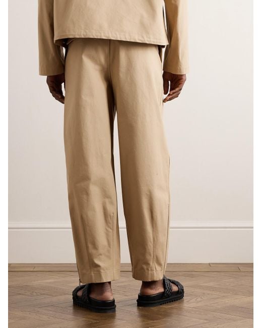 Pantaloni a gamba affusolata in tela di cotone con pinces e cintura di Jil Sander in Natural da Uomo