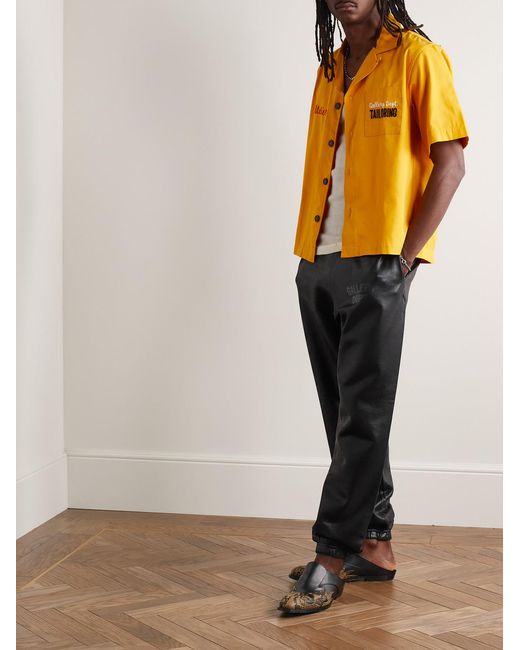GALLERY DEPT. Black Analog Tapered Logo-Print Coated Cotton-Jersey Sweatpants for men