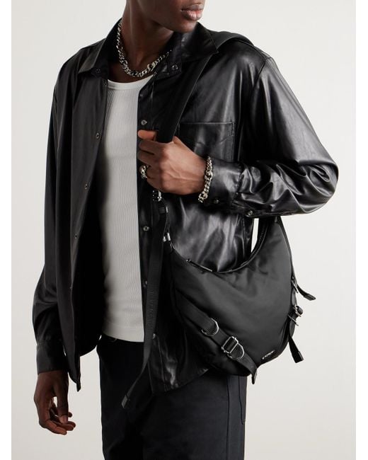 Givenchy Black Voyou Buckled Webbing-trimmed Padded Nylon Messenger Bag for men
