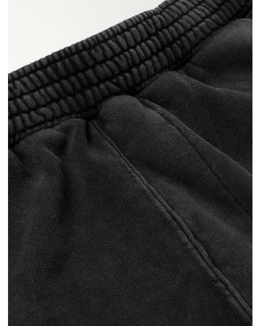 Shorts a gamba larga in jersey di cotone sfrangiato di Givenchy in Black da Uomo