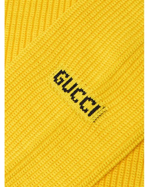 Gucci Pullover aus einer Baumwollmischung in Rippstrick mit Zierknöpfen und Intarsienlogomotiv in Yellow für Herren