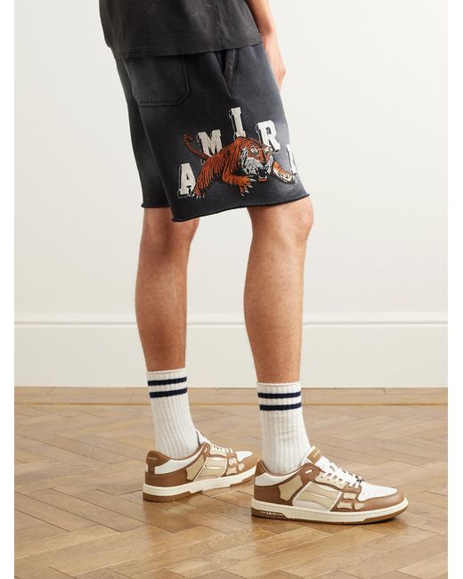 Amiri Black Wide-Leg Logo-Print Distressed Cotton-Jersey Drawstring Shorts for men