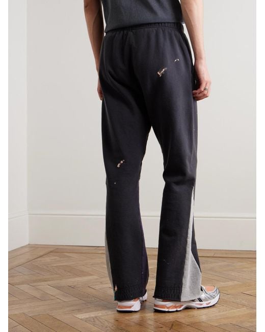 GALLERY DEPT. Blue Flared Paint-Splattered Panelled Logo-Print Cotton-Jersey Sweatpants for men