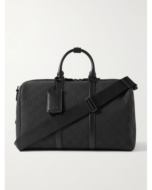 Gucci Black Edge Leather-trimmed Monogrammed Rubber Duffle Bag for men