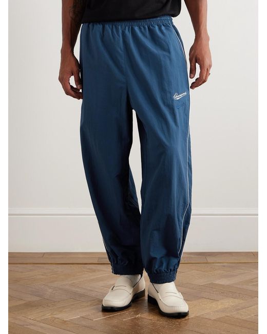Willy Chavarria Blue Bad Boy Tapered Logo-Embroidered Piped Shell Trackpants for men