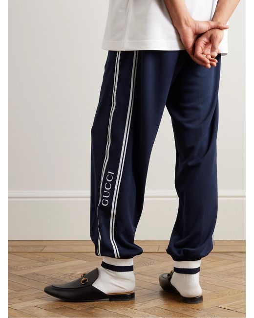 Gucci Schmal zulaufende Jogginghose aus Jersey mit Streifen und Logoprint in Blue für Herren