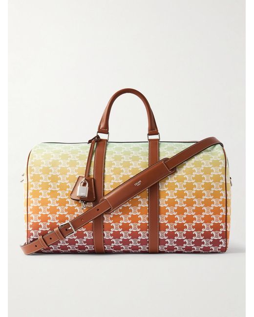 Medium Voyage Leather-Trimmed Logo-Print Coated-Canvas Holdall di Céline in Natural da Uomo