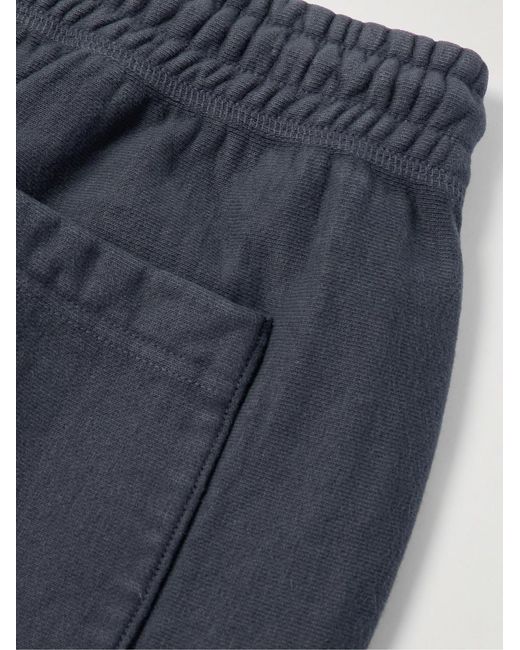 SAINT Mxxxxxx Blue Tapered Logo-Print Cotton-Blend Jersey Sweatpants for men