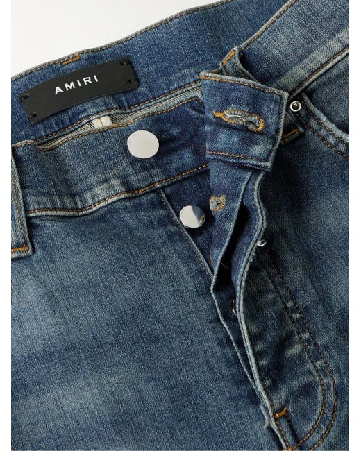 Amiri Blue Mx1 Skinny-fit Panelled Distressed Jeans for men