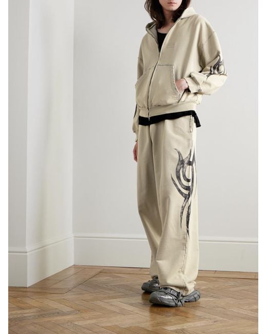 Balenciaga Weit geschnittene Jogginghose aus Baumwoll-Jersey mit Print in Distressed-Optik in Natural für Herren