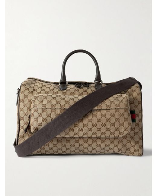 Gucci Leather Trimmed Monogrammed Coated Canvas Duffle Bag in Brown for Men Lyst UK