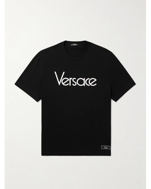 T-shirt in jersey di cotone con logo ricamato e applicazione di Versace in Black da Uomo