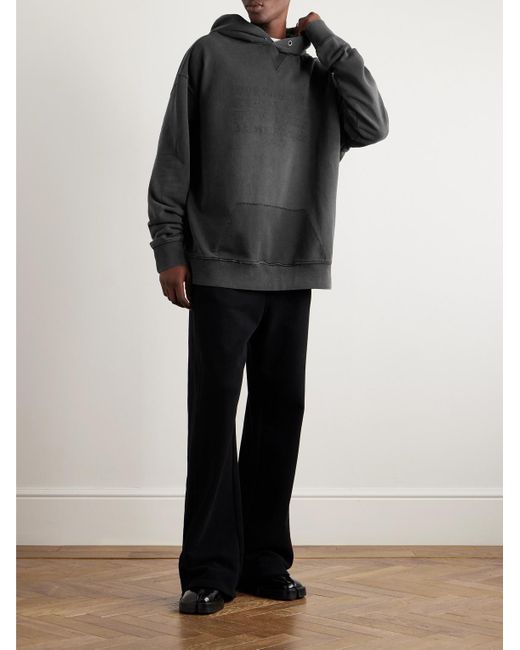 Felpa oversize in jersey di cotone tinta in capo con cappuccio e logo ricamato di Maison Margiela in Black da Uomo