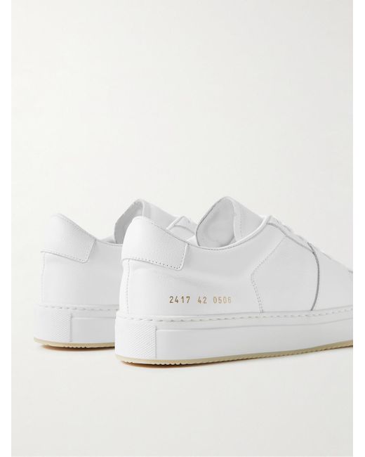 Sneakers in pelle pieno fiore Decades di Common Projects in White da Uomo