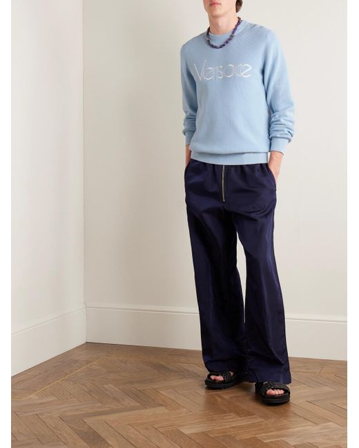 Versace Pullover aus einer Baumwollmischung mit Logostickerei in Blue für Herren