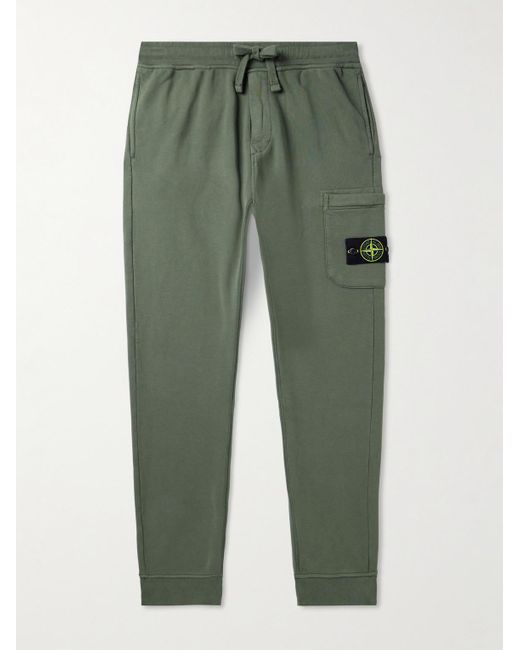 Stone Island Green Tapered Logo-appliquéd Garment-dyed Cotton-jersey Sweatpants for men