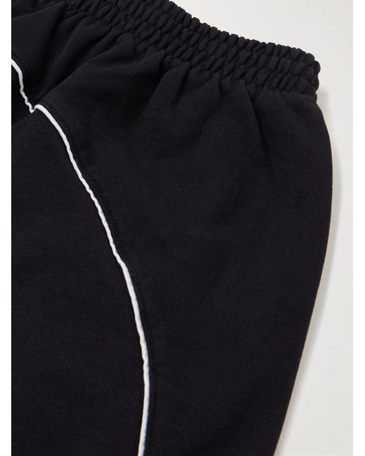 Pantaloni sportivi a gamba larga in jersey di cotone con logo ricamato di Balenciaga in Black da Uomo