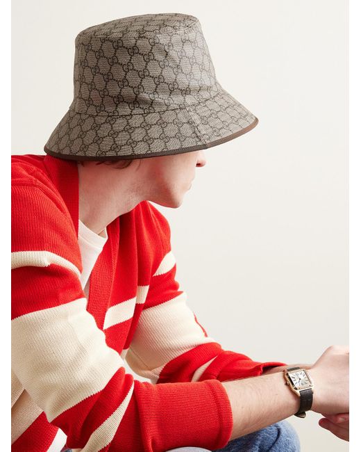 Cappello da pescatore in tela spalmata con monogramma di Gucci in Natural da Uomo