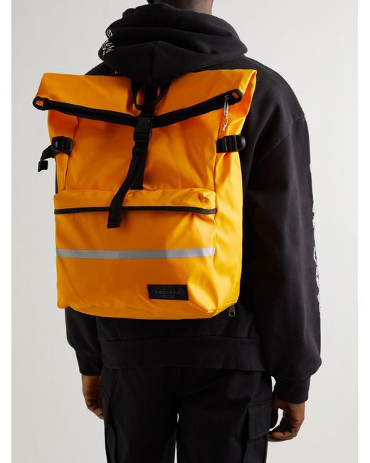 Eastpak Maclo Tarp Young Coated-canvas Cycling Backpack in Orange for Men |  Lyst Australia