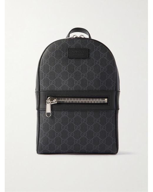Gucci Black Leather-trimmed Monogrammed Coated-canvas Sling Backpack for men