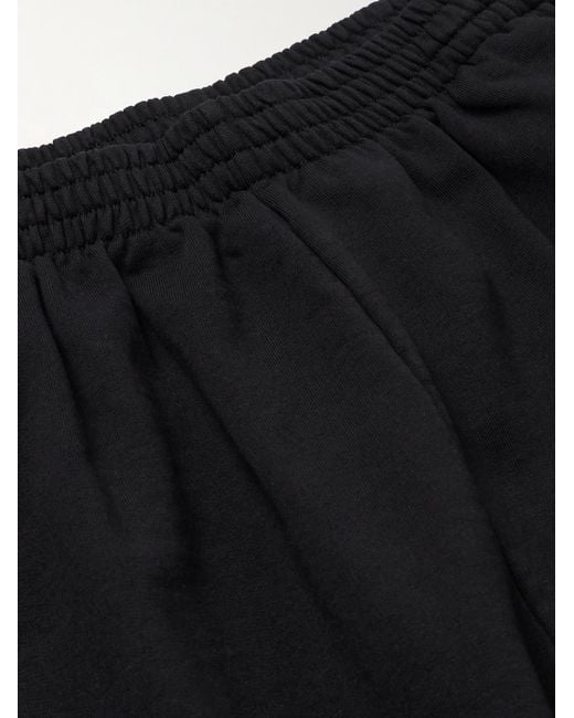 Pantaloni sportivi a gamba larga in jersey di cotone con logo ricamato di Balenciaga in Black da Uomo