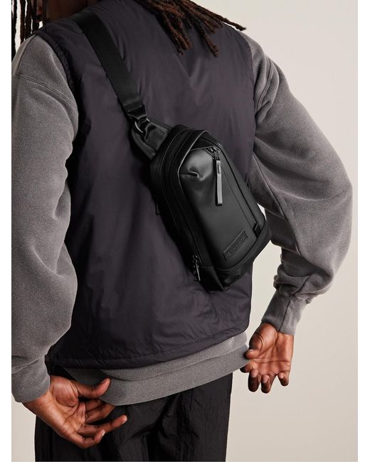 Master Piece Black Slick Logo-Appliquéd Leather And Cordura Barastec Nylon Sling Backpack for men