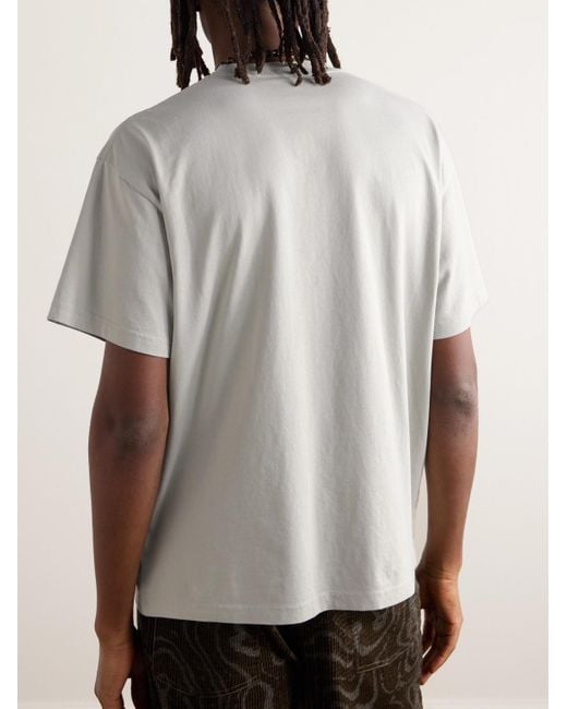 T-shirt in jersey di cotone con stampa Worm Food di Brain Dead in White da Uomo