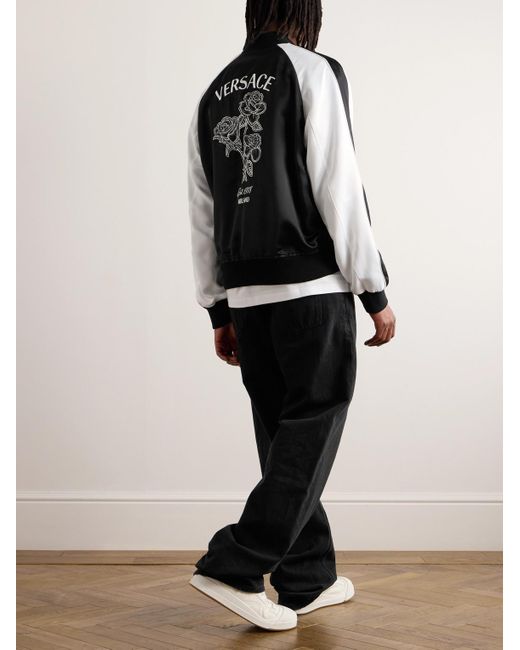 Versace Bomberjacke aus glänzendem Twill mit Streifen und Logostickerei in Black für Herren