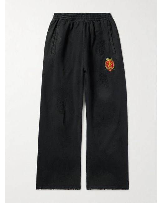 Balenciaga Black Wide-leg Distressed Logo-appliquéd Cotton-jersey Sweatpants for men