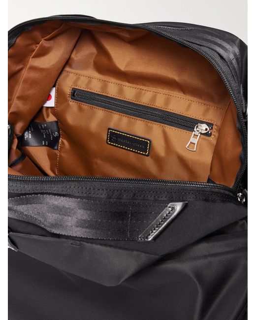 Cocoon Leather-Trimmed Recycled Nylon Weekend Bag di Master Piece in Black da Uomo